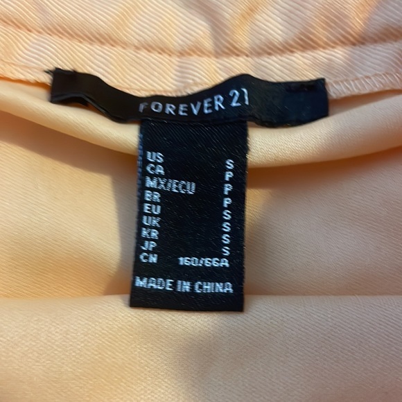 NWT Forever 21 Orange Pleated Mini Skirt - Picture 4 of 4